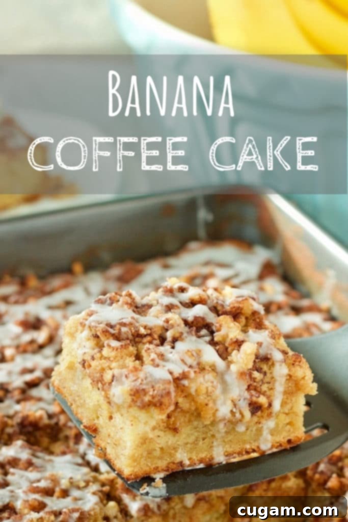 Slice of banana coffee cake on a spatula above a pan of cake. 
