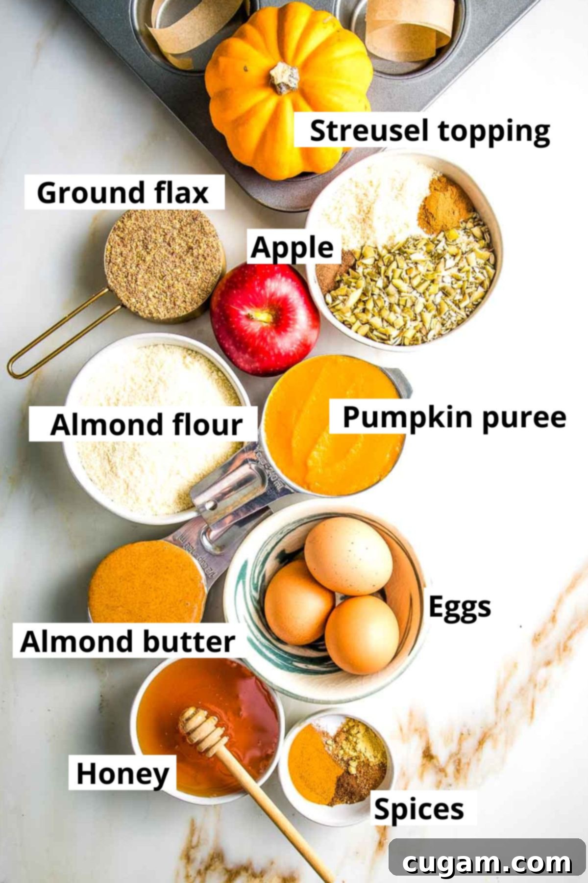 Labeled ingredients: pumpkin puree, ground flax, almond flour, eggs, almond butter, honey, spices, streusel topping.