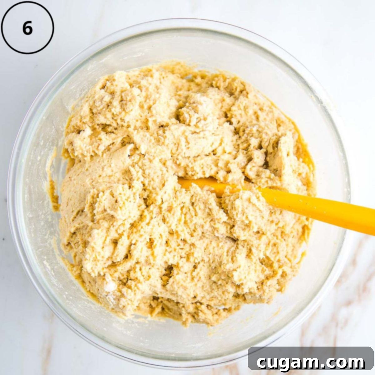 Gluten-Free Vegan Double Corn Cornbread 9 A large bowl contains the thick, pasty cornbread batter after the wet and dry ingredients have been combined, ready for baking.
