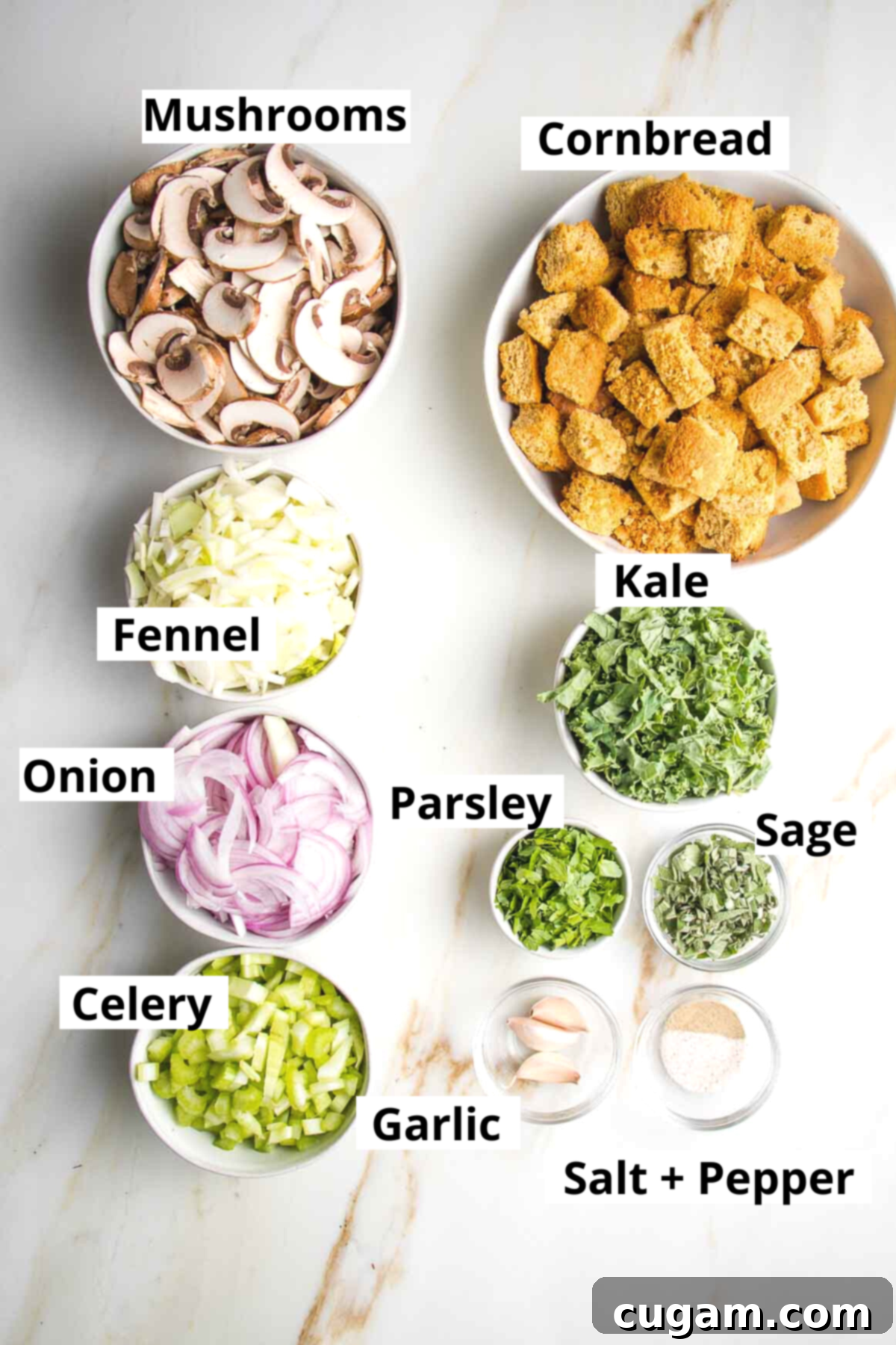Labeled ingredient photos for vegan cornbread stuffing: cubes of cornbread, sliced mushrooms, chopped fennel, diced onion, sliced celery, fresh parsley, fresh sage, minced garlic, salt, and pepper arranged on a white background.