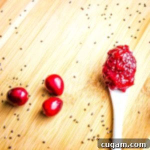A small jar of cranberry chia jam.