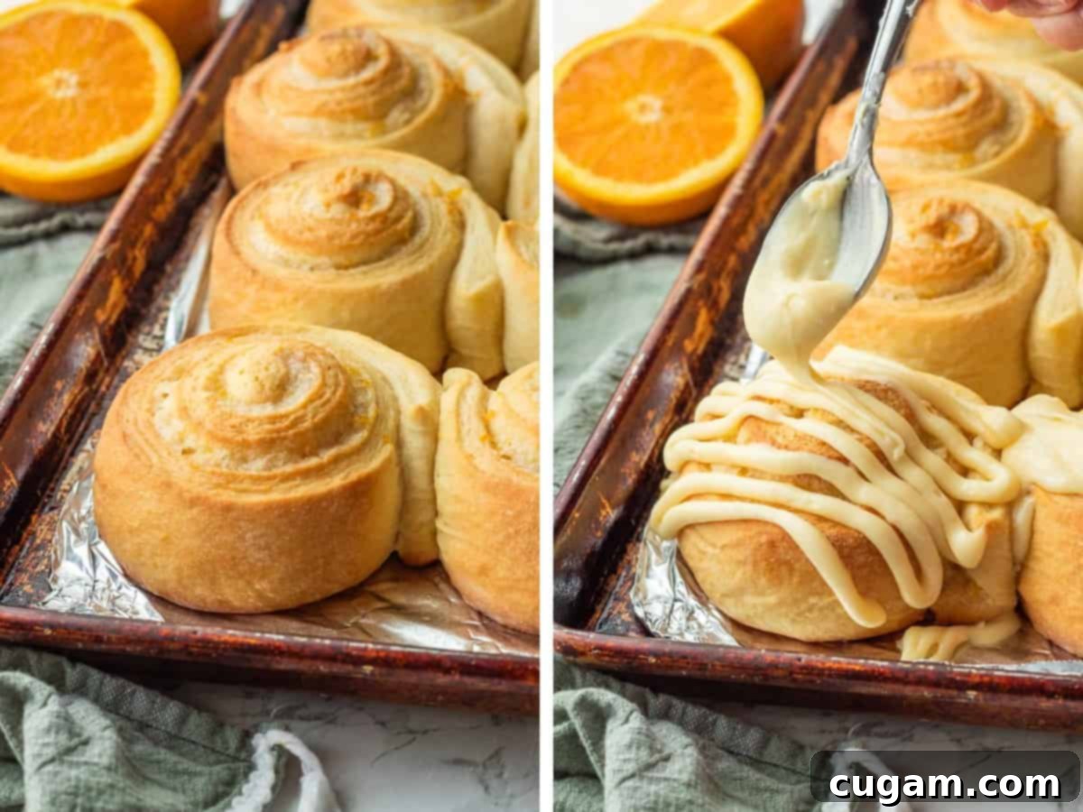 Drizzling icing over baked homemade orange rolls.