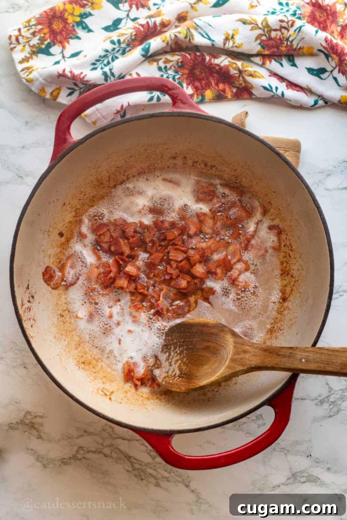 Cooked bacon in large cooking pot.