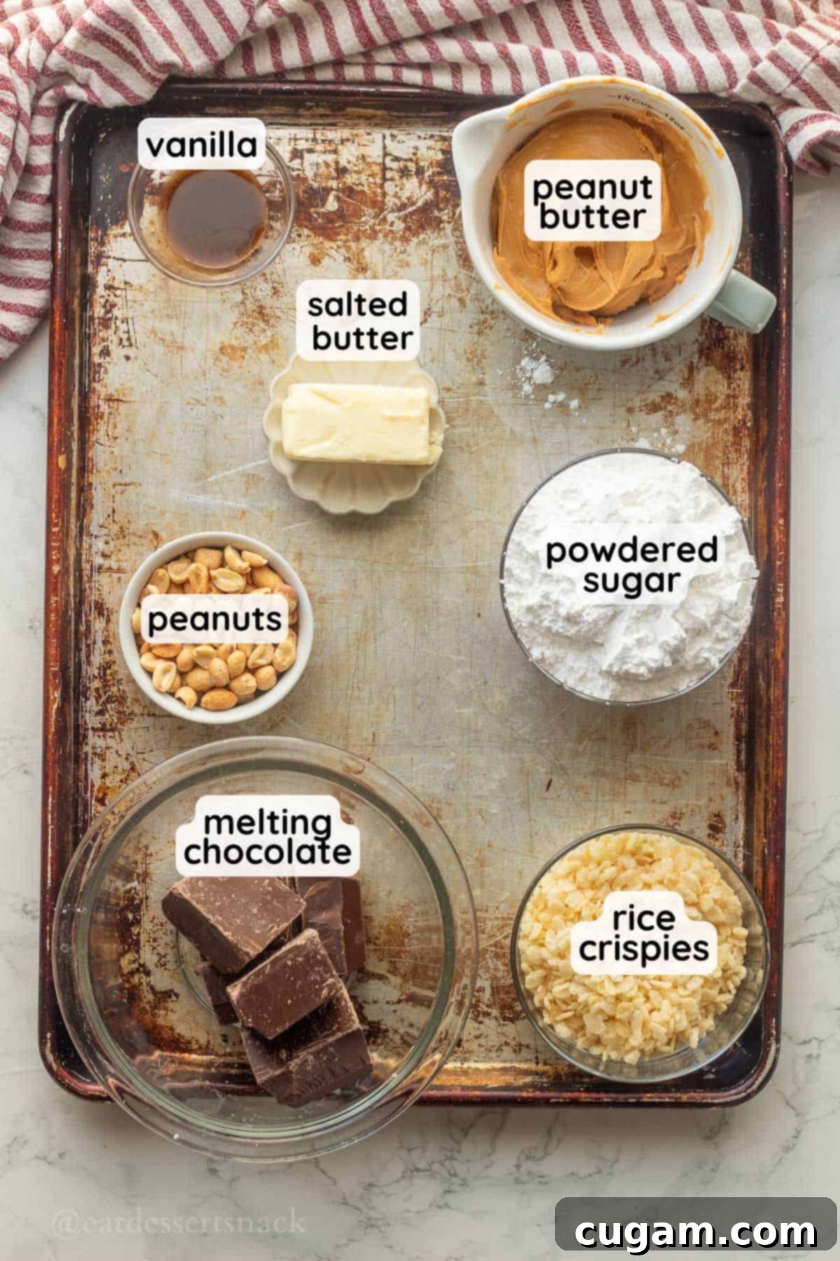 Peanut Butter Rice Crispy Bites 3 Labeled ingredients for peanut butter balls on metal tray.
