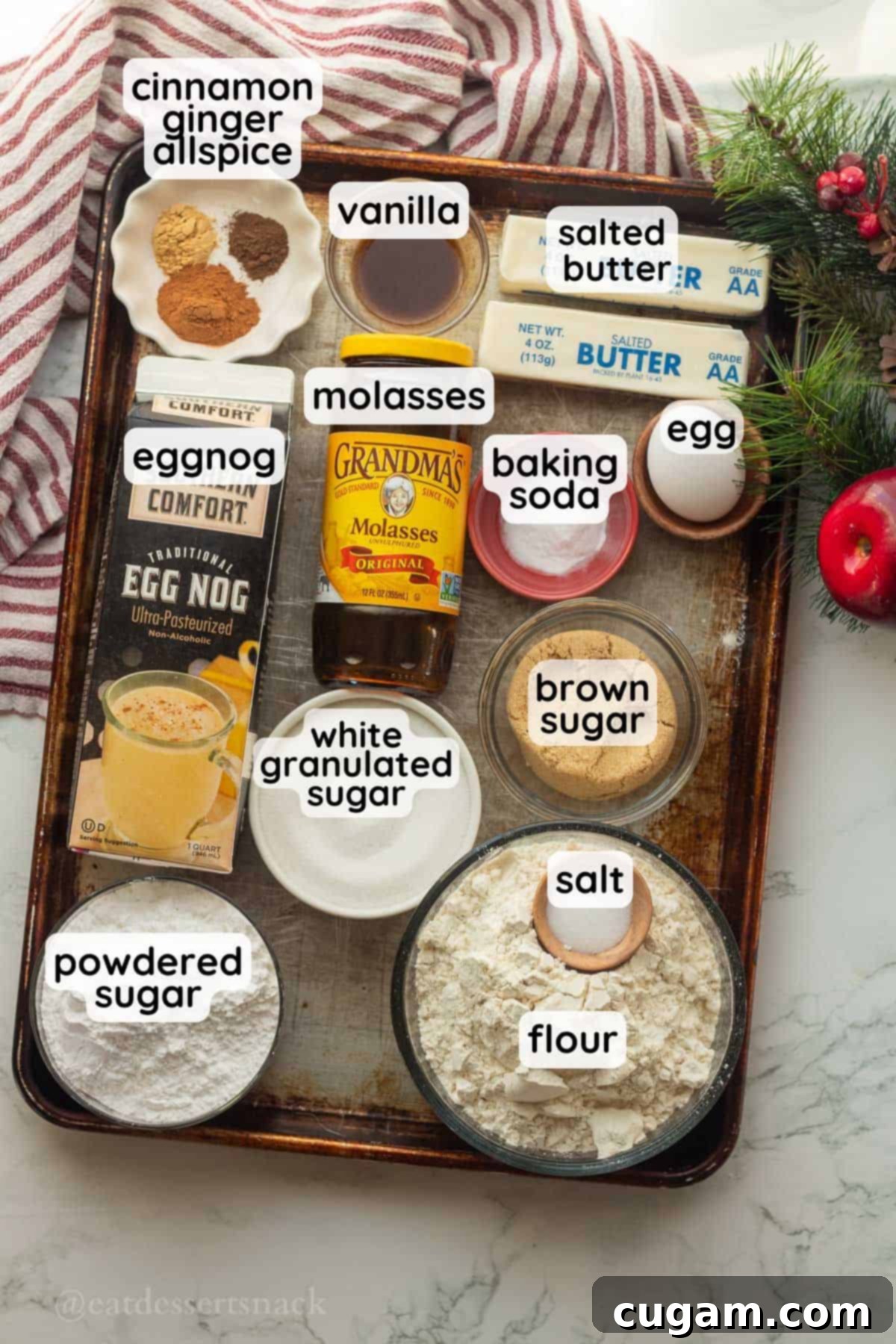 Frosted Gingerbread Squares 3 Labeled ingredients in glass bowls on a baking sheet, ready for making gingerbread bars with frosting.