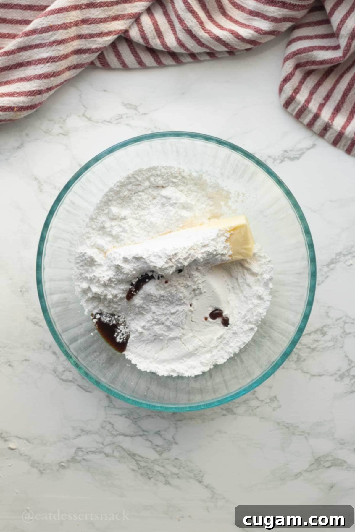 Frosted Gingerbread Squares 9 Powdered sugar, butter, and vanilla in a mixing bowl for the frosting.