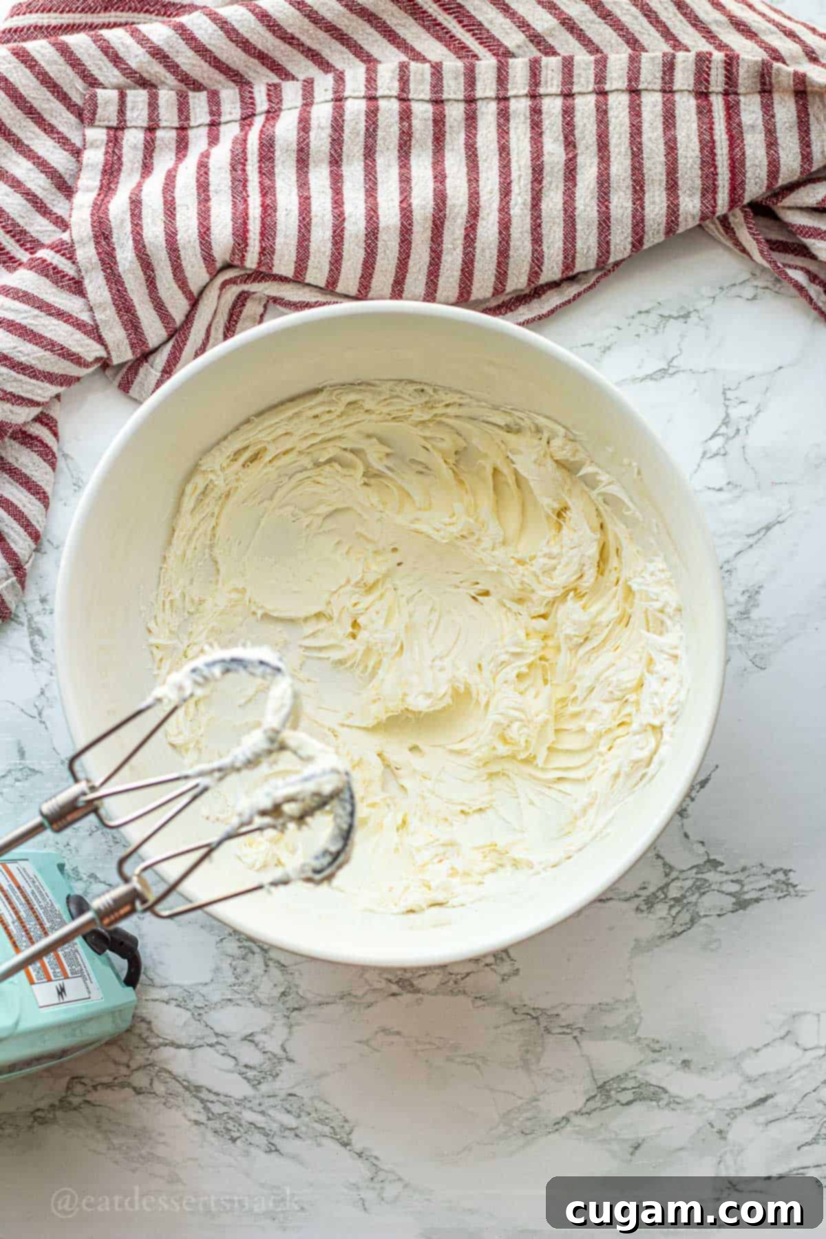 Strawberry Cheesecake Ice Cream (Easy Homemade Recipe) 4 Whipping cream in a bowl.